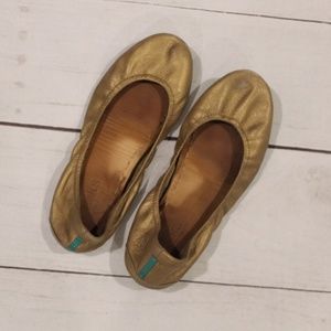 Metallic gold Tieks leather ballet flats